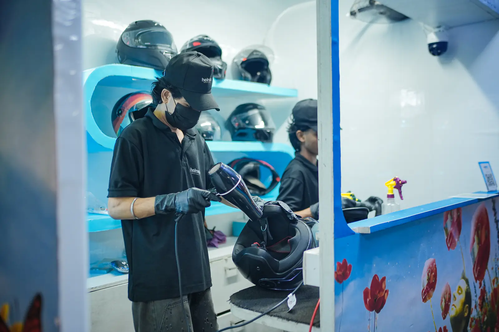 Warm-air drying a cleaned helmet before it goes back to the rider